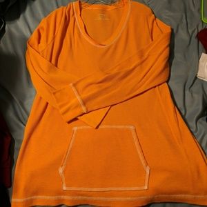 Orange long sleeved shirt